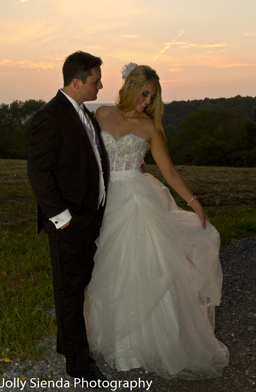 Portrait of the bride and groom at sunset