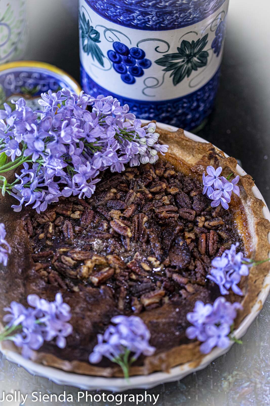 Pecan pie with lilac flowers