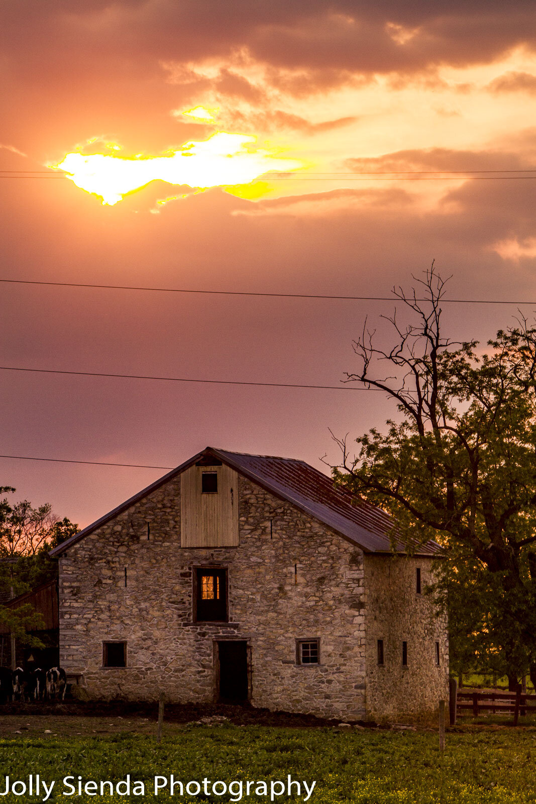 Stone barn, old farm, sunset