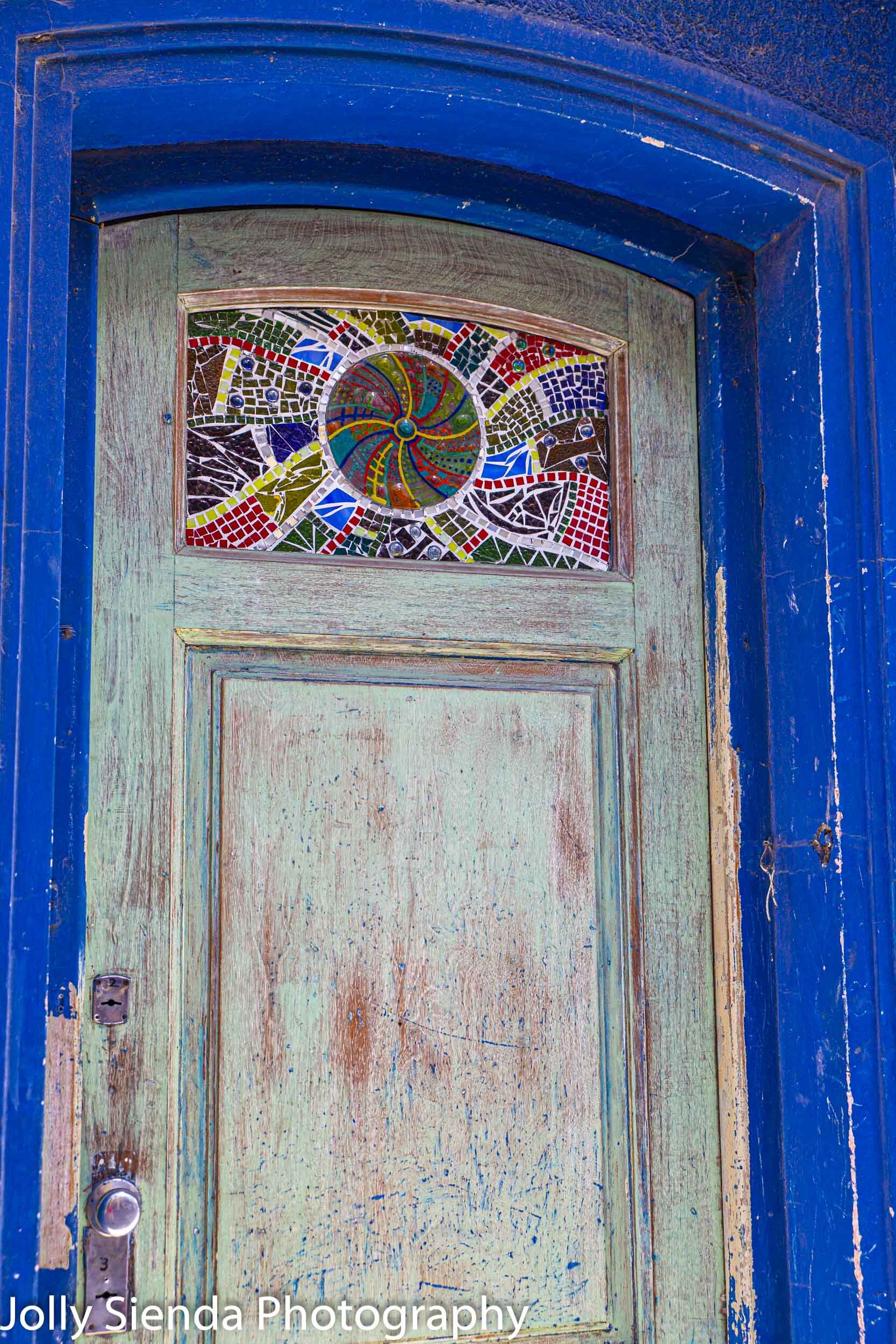 Stained glass window and the blue door
