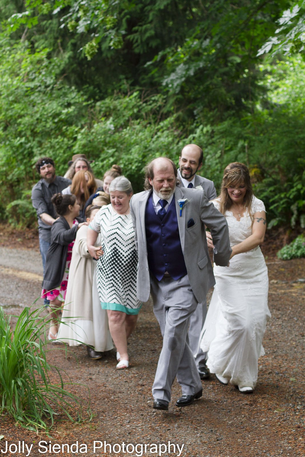 Wedding party and guest congo line, Pacific Northwest wedding ph