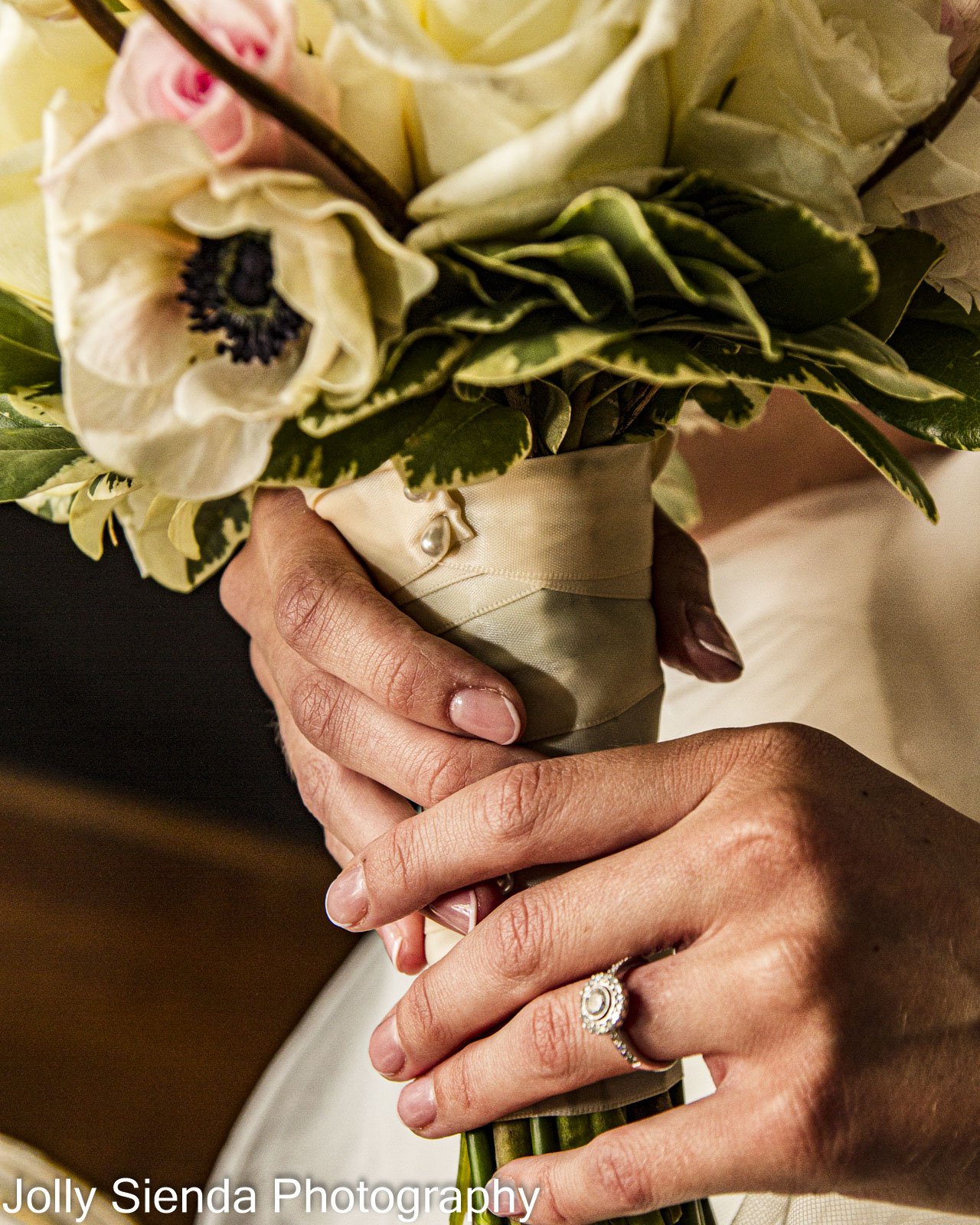 Bridal bouquet and the diamond engagement ring