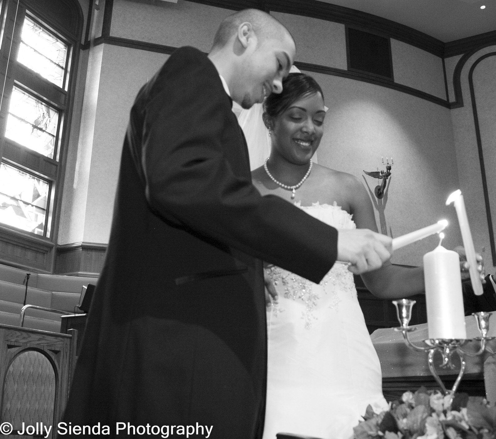 Lighting the Unity Candle at a wedding