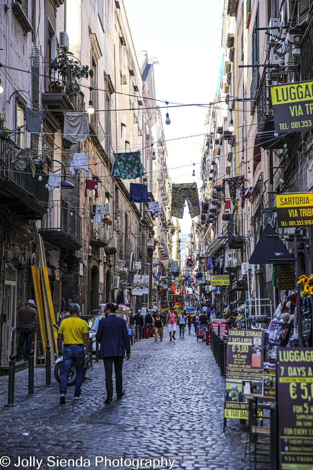 Gritty city life, laundry, neighborhood, business, in Naples