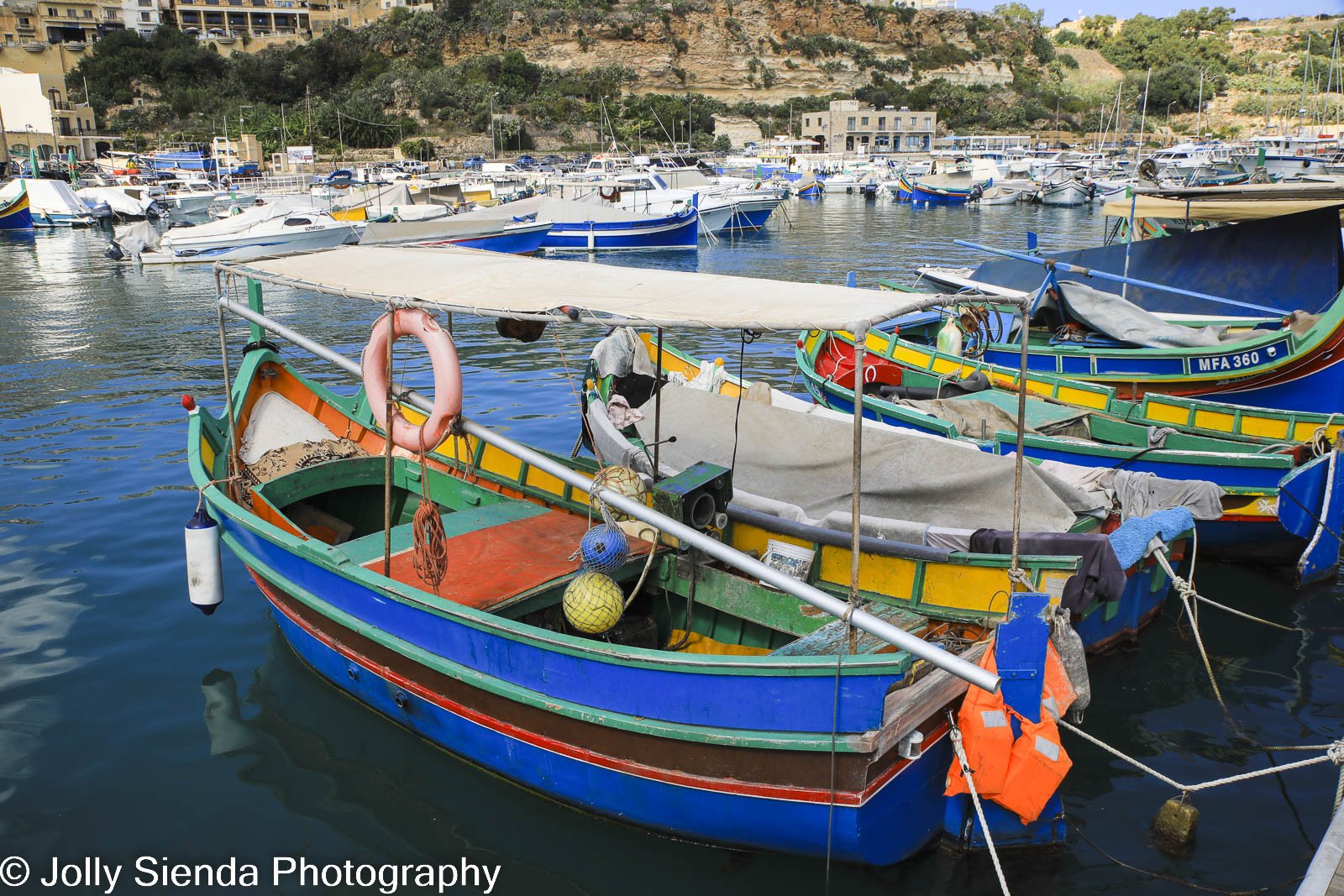Colorful boats, harbor, wooden boats at Goza