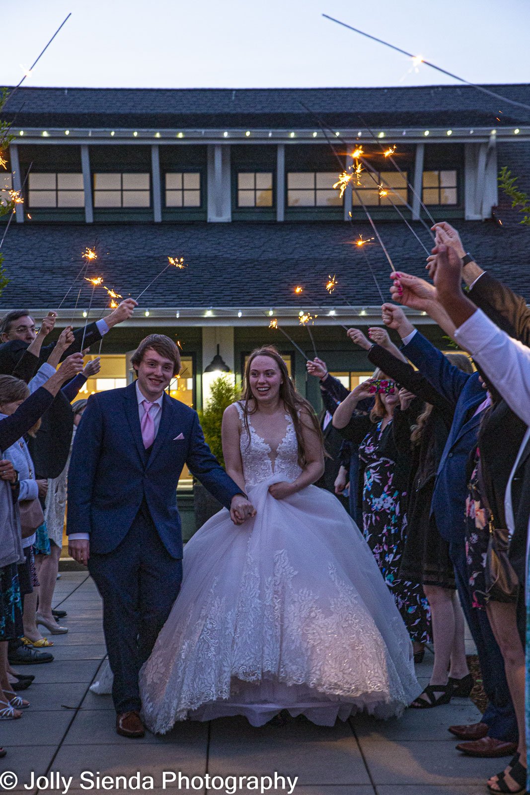 Sparklers with bride and groom ending wedding at Port Gamble Wed