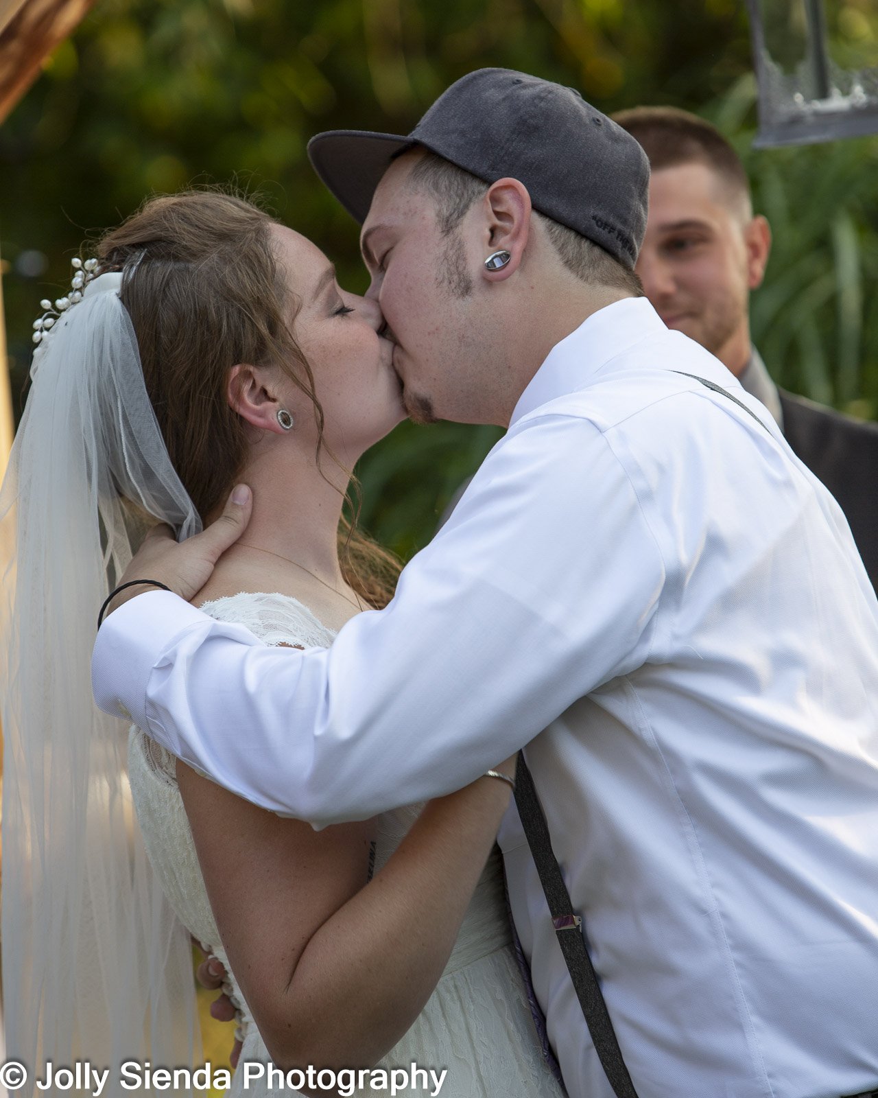 Wedding ceremony kiss at Dan's and Maurean's Belfair WA wedding