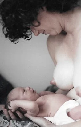 An example of co-regulation of the nervous system between mother and newborn. (Yep, that's me and my daughter. . . ) Breastfeeding is also part of the elegant system of co-regulation, calming and fostering the feeling of safety for both.