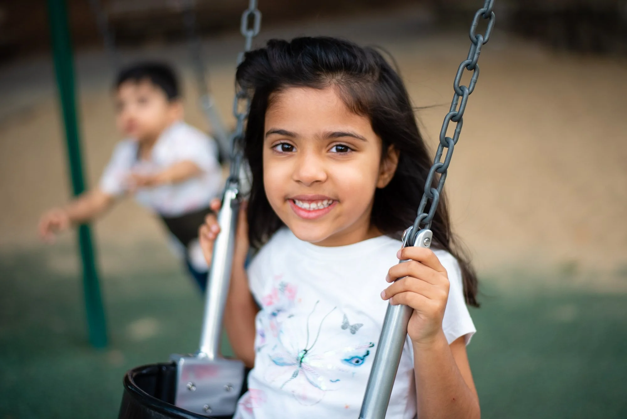 Playful-family-photography-session-mountain-view-swing-siblings.jpg