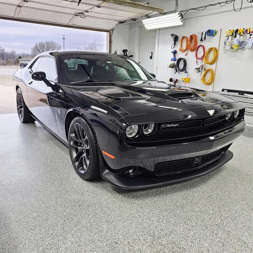 Glossy black Challenger after polishing and protection