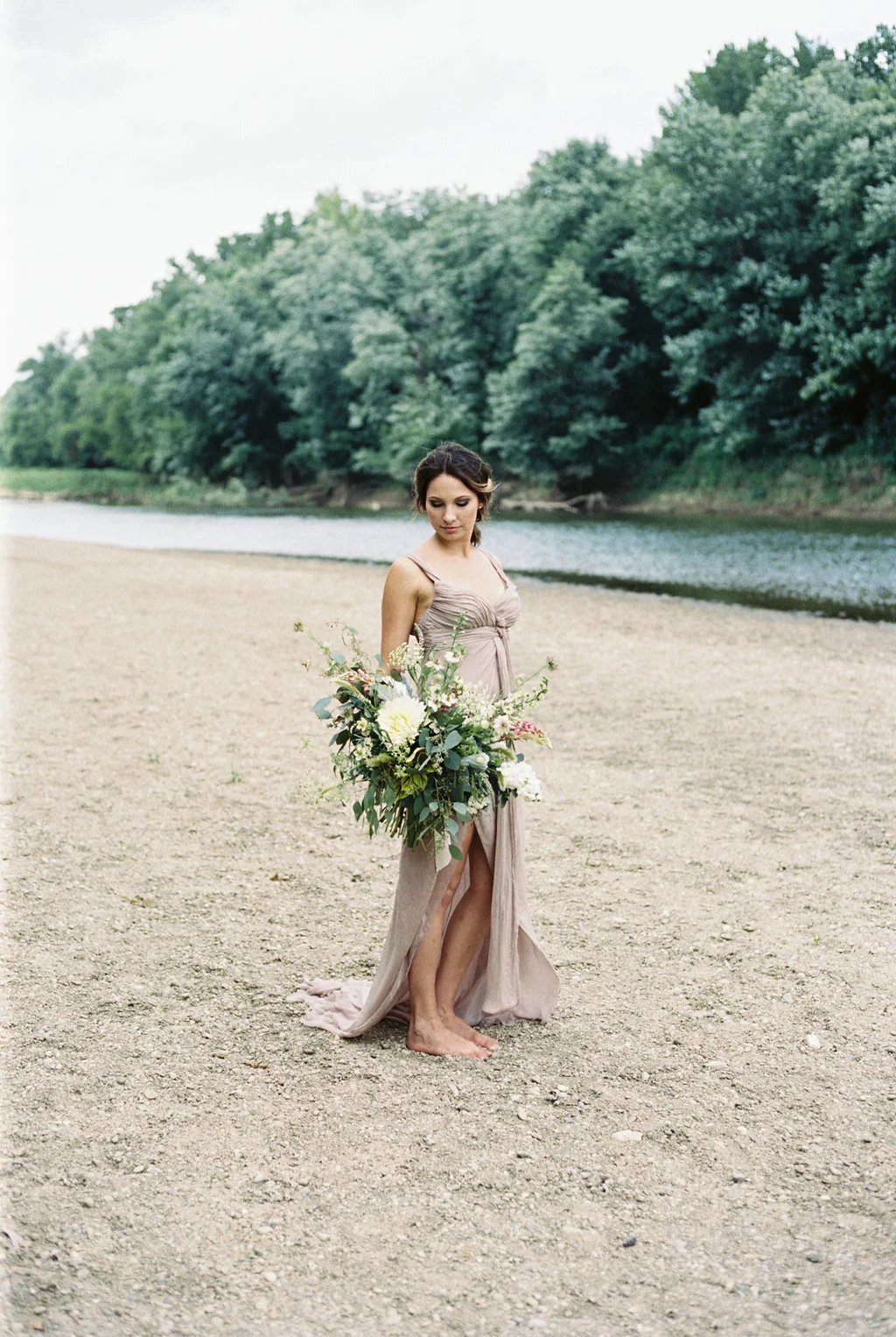 River's edge elopement with floral by Yellow Canary Floral & Event Design. Photos by Caroline Koehler Photography
