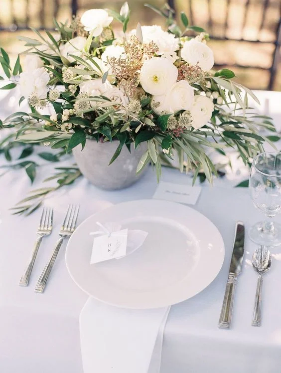 Olive and white florals with ceramic vessels