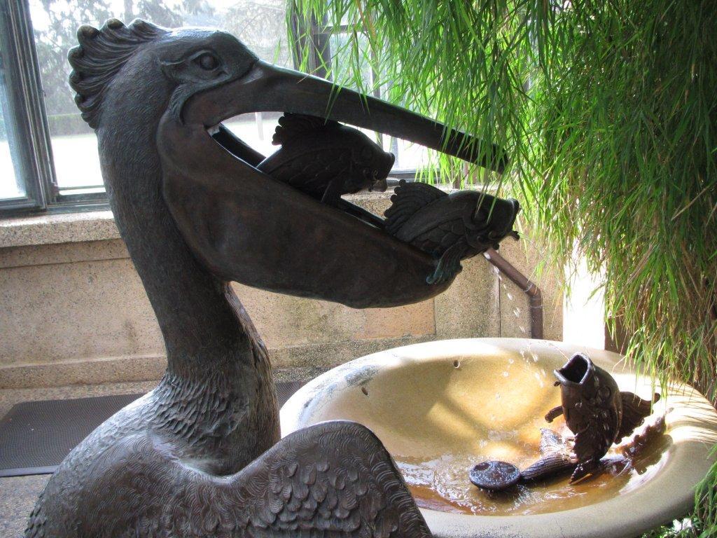 Pelican with fish fountain