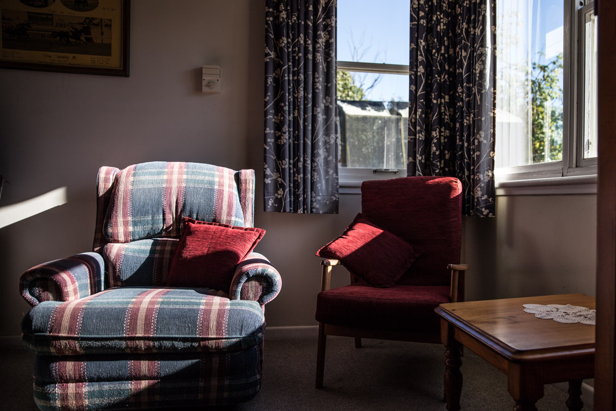 two arm chairs in the sunlight in old Geelong home