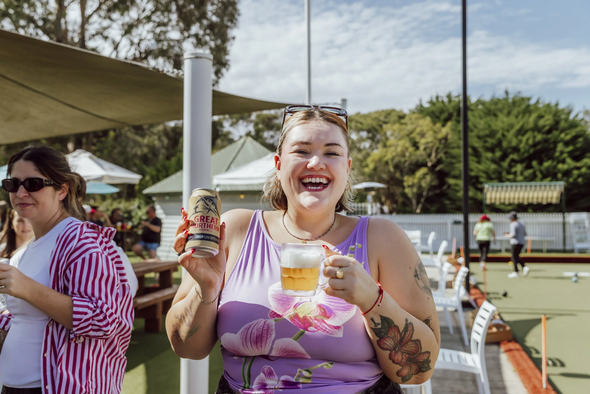 Team member celebrating with drinks at a company social event