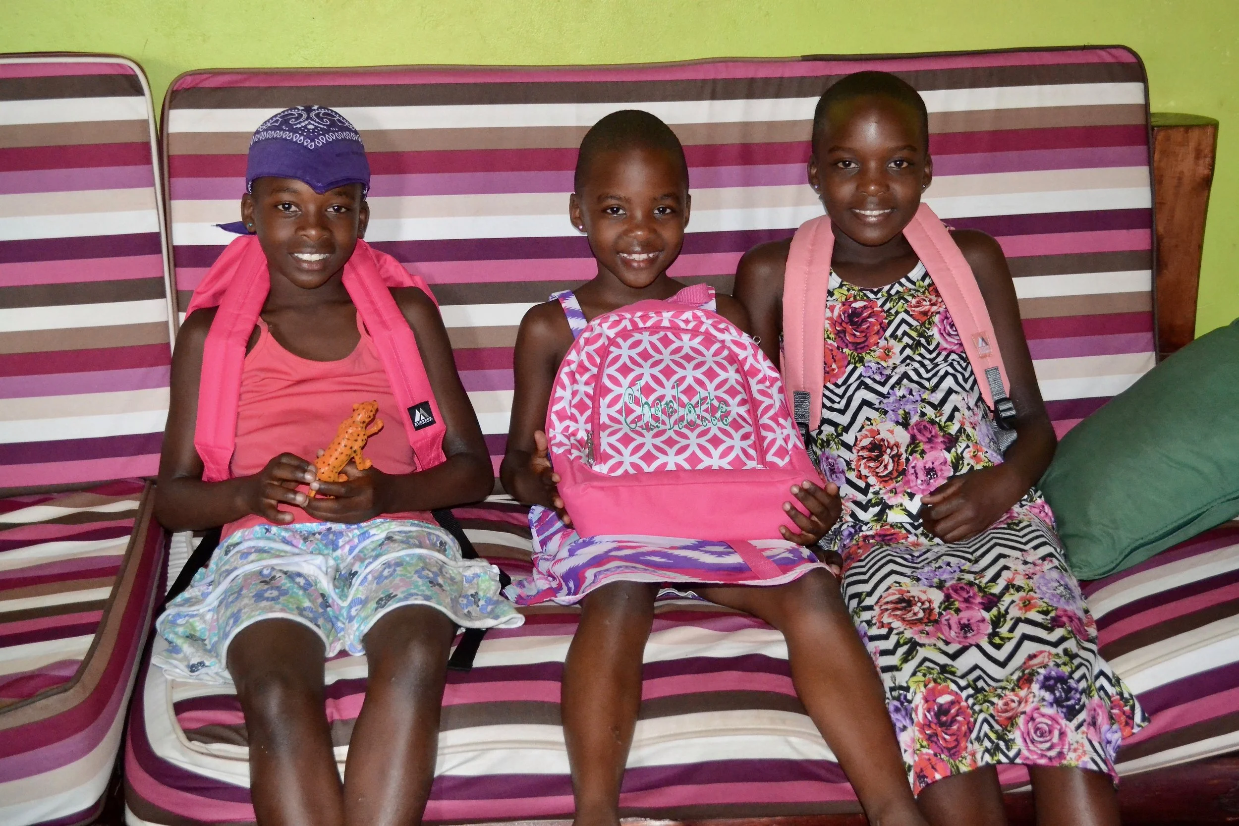 Tendo, Suubi, Melody new backpacks May 2017.jpg