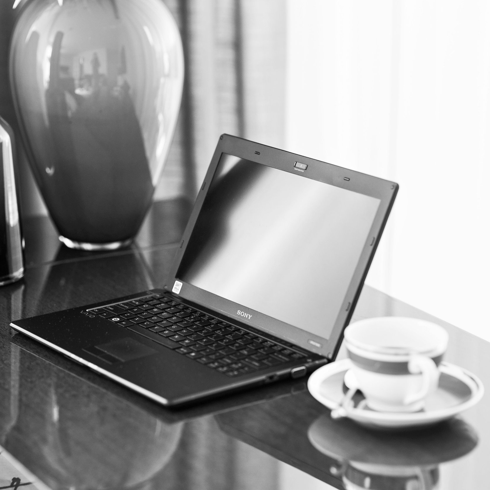 Canva+-+Home+office+desk+with+laptop+and+coffee.jpg