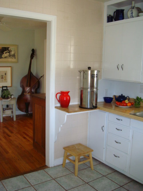 from kitchen door west wall into dining area (that we don't use ).JPG