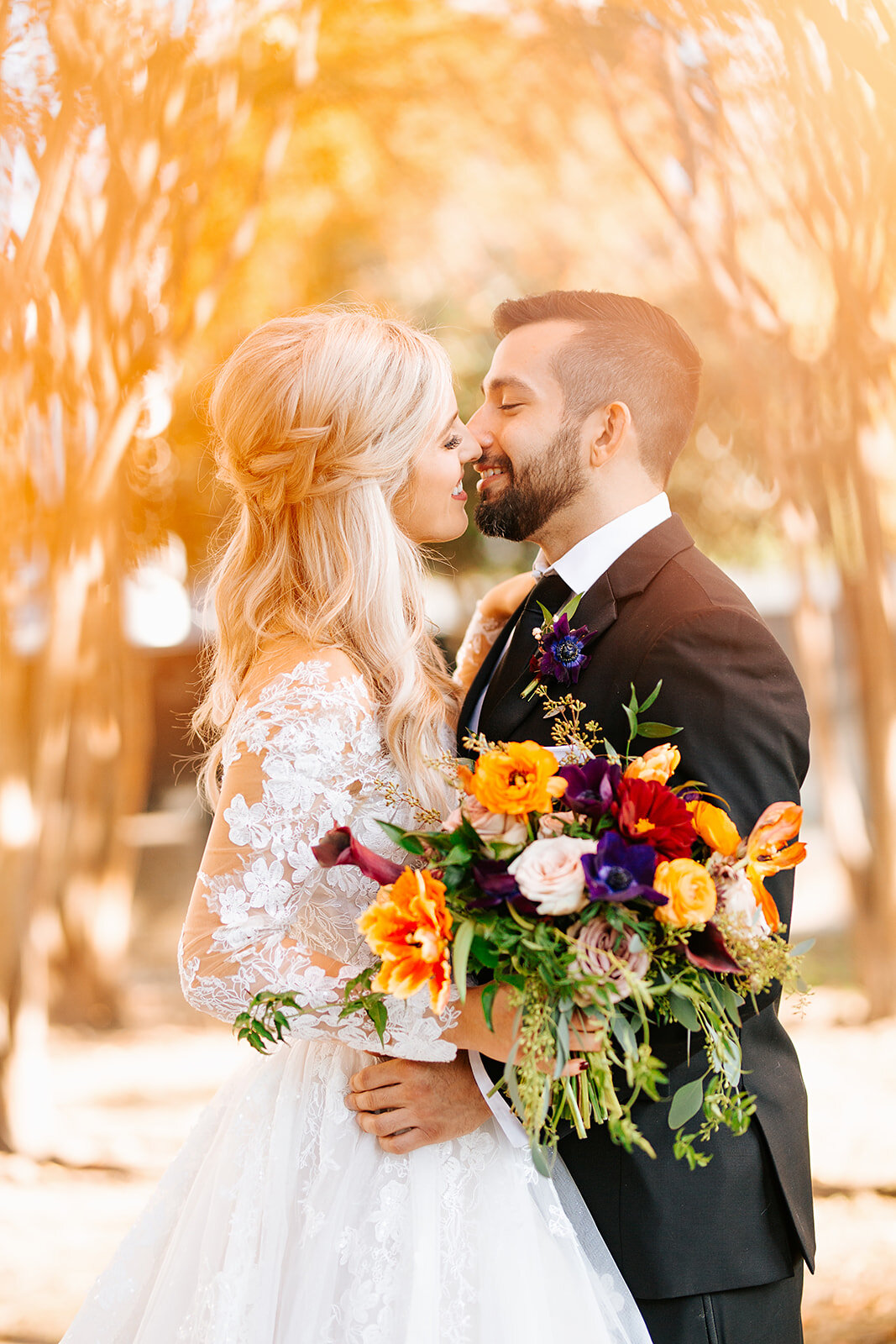 balinese-ballroom-bride-groom-vibrant-flowers