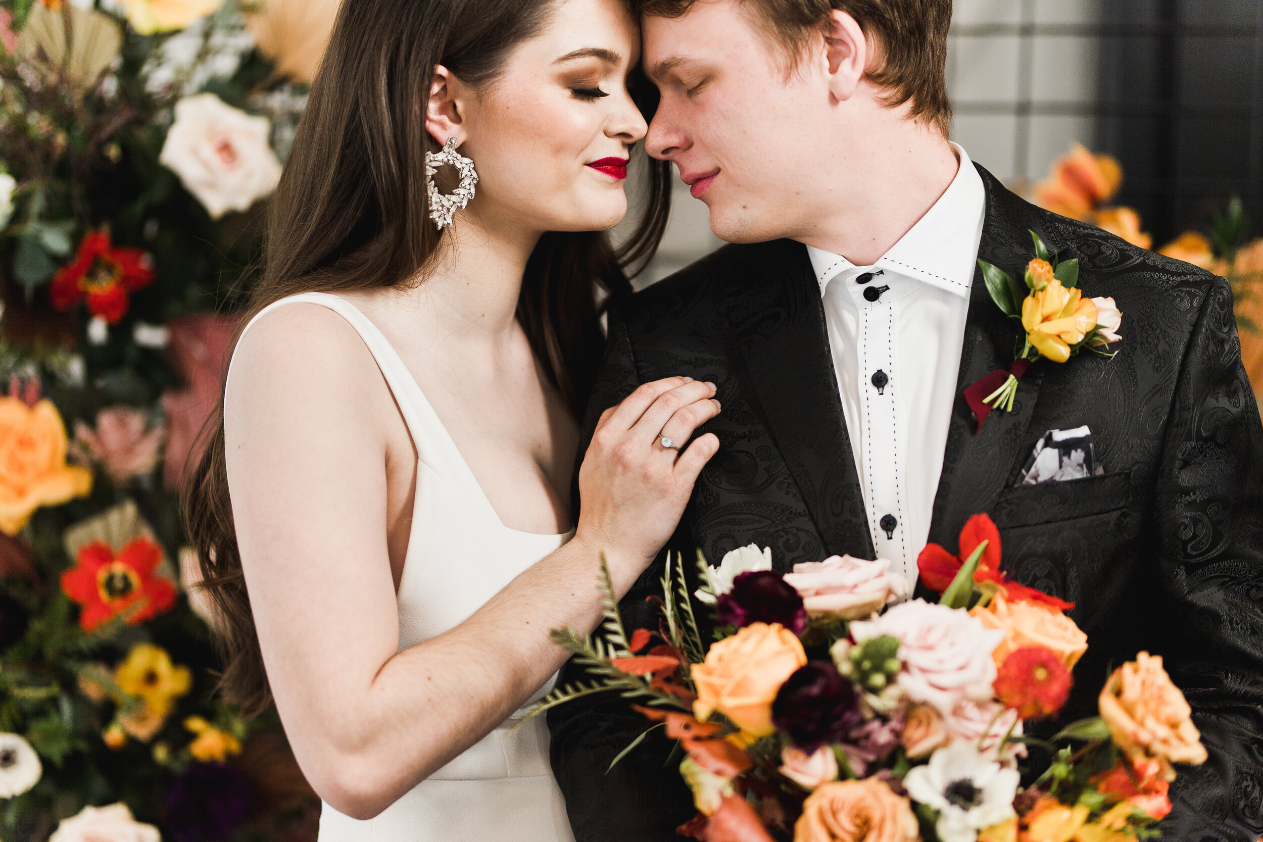 bride-groom-orange-roses