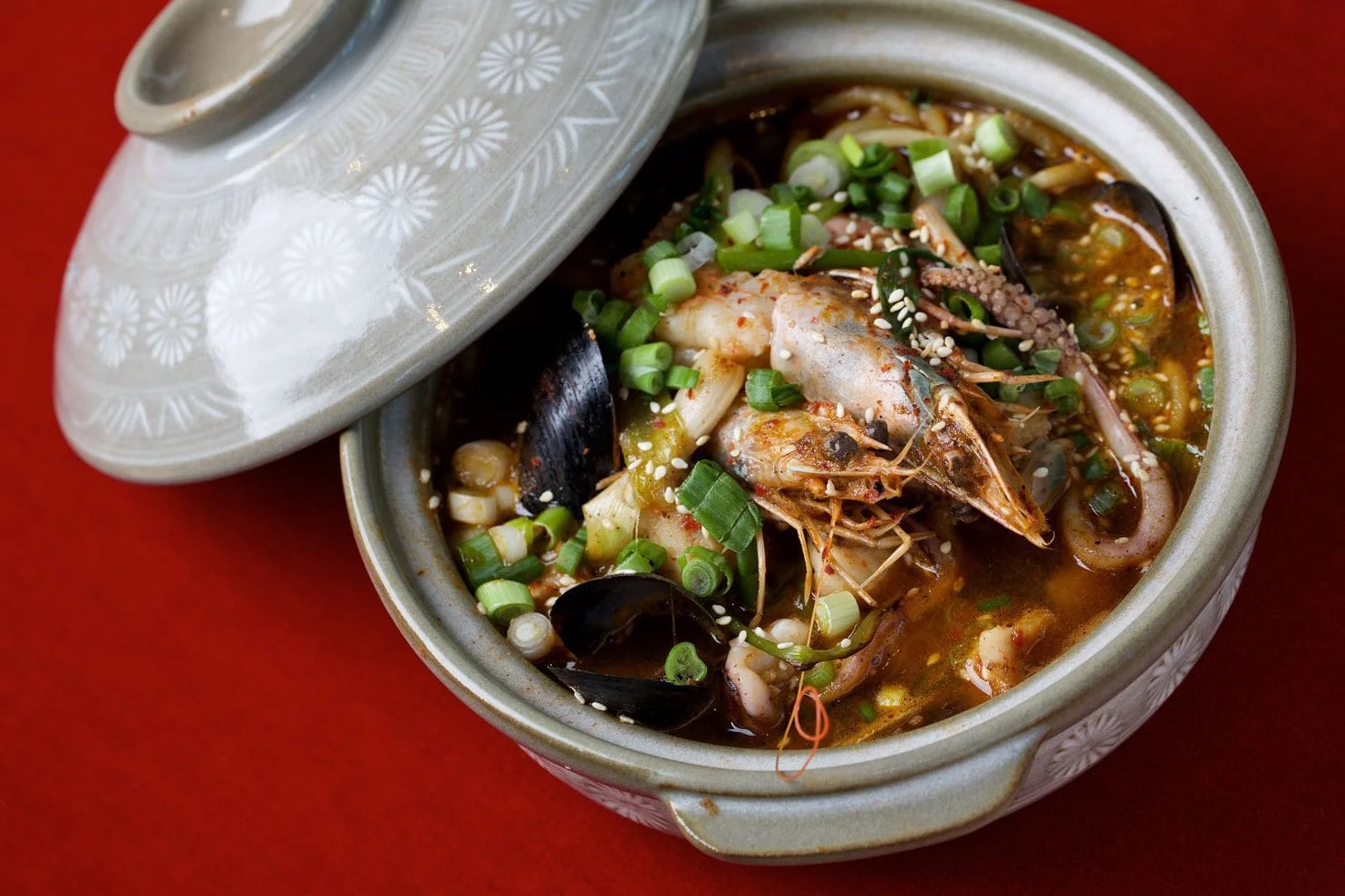 "Jjampong, a Korean seafood and egg noodle dish, is on the top portion of the three-part menu at Kaliwa. (Deb Lindsey/For The Washington Post)