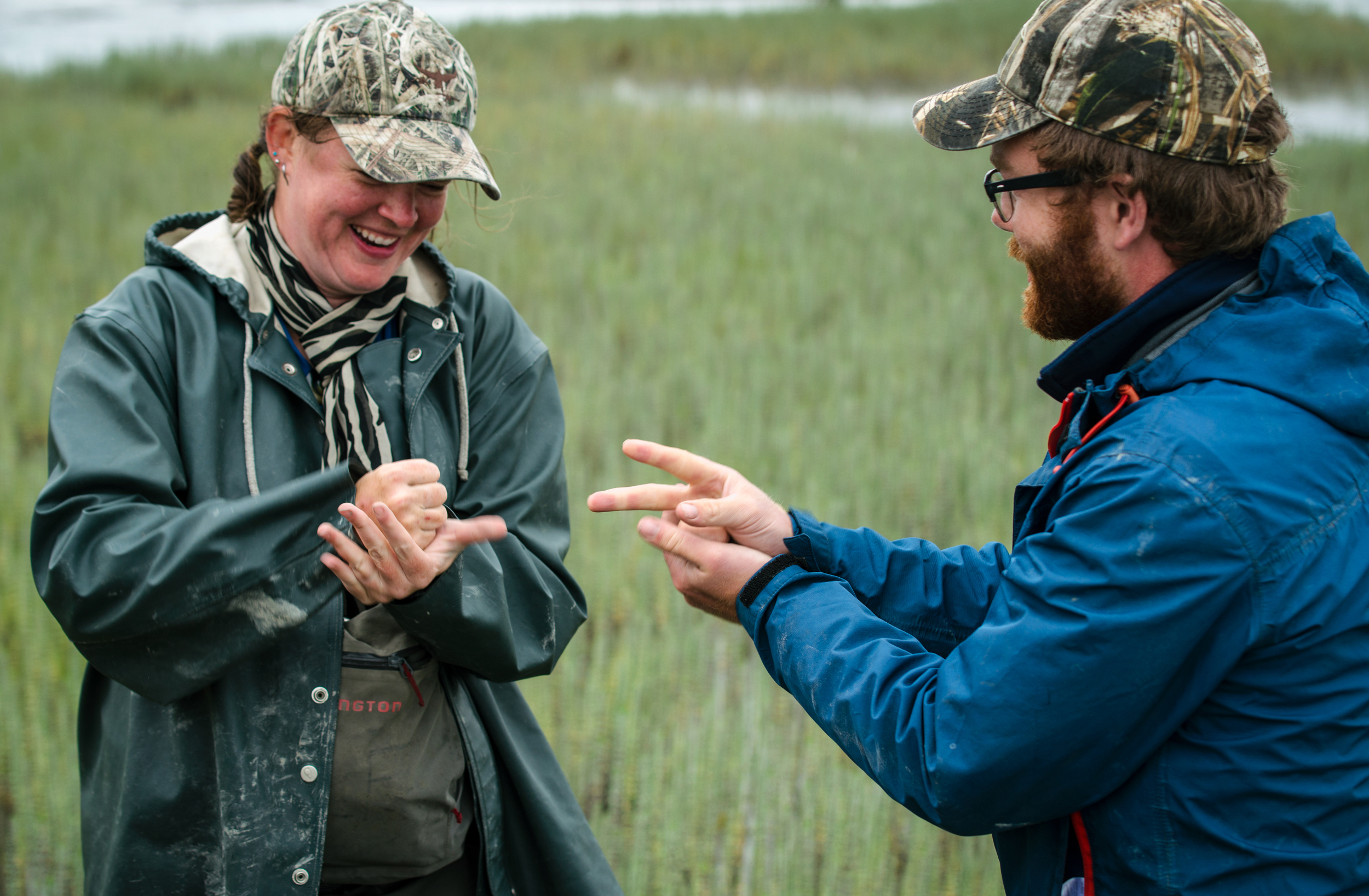  Navigating the field is tough on the body and the mind, but Gabrielson finds joy in her work through the interactions she has with nature and her team. Here, her and an Matt Prinzing, a wildlife intern she has been mentoring, battle it out to see wh