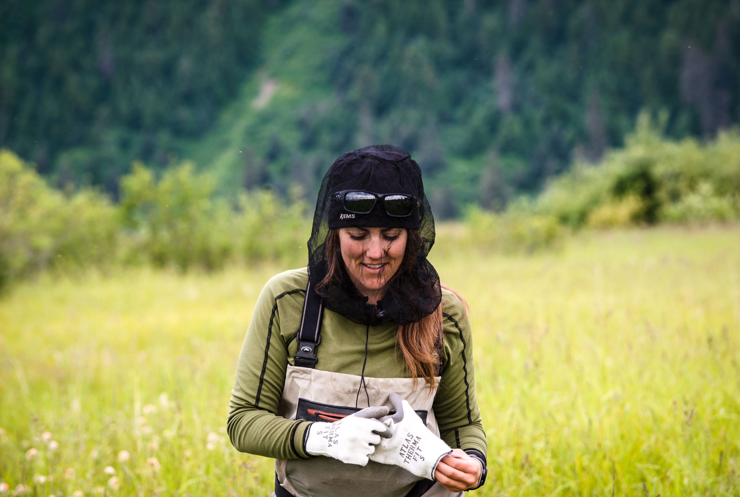  Camarata gears up for a long day of manual labor, where the USFS staff will work on building a plastic barrier around a pond that will become a study site of the invasive species, Elodea. 