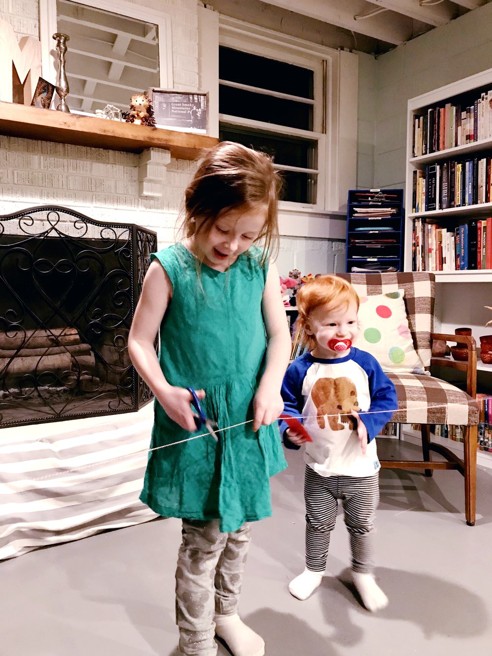 The opening of Courtney's Family Library this past Winter Break! And that precious Eric Carle shirt!!