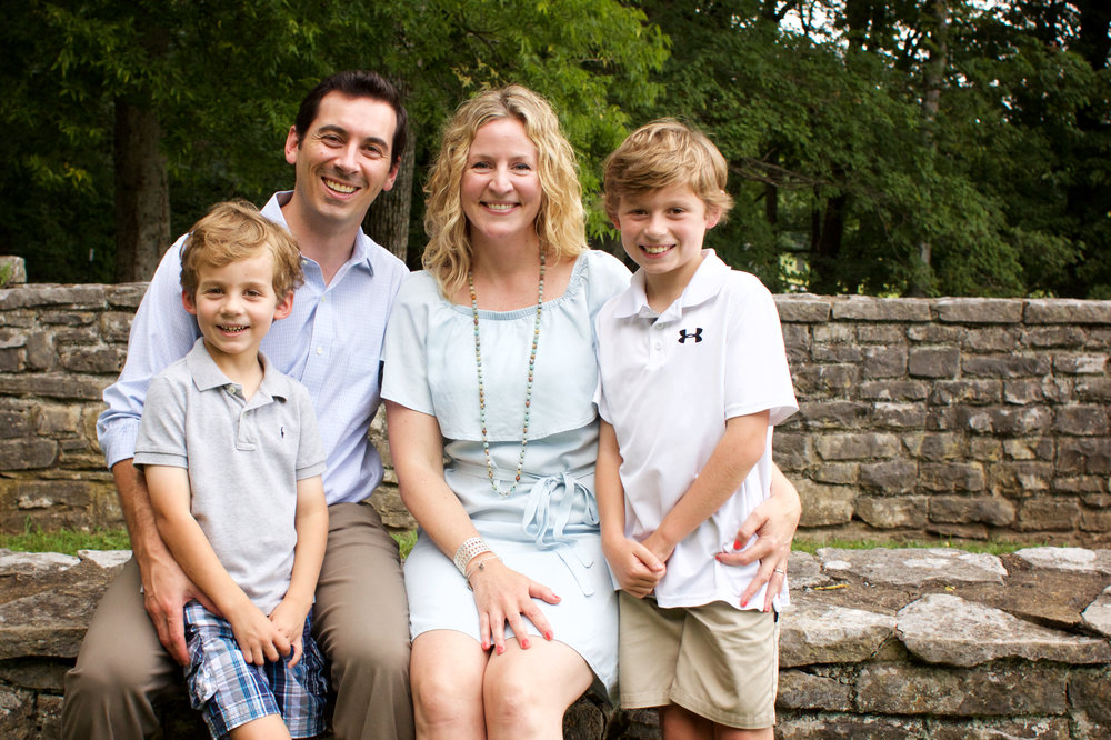 Leslie and her sweet family - Chris, Hank, and Houston. "Poop" was definitely mentioned to get those great smiles.