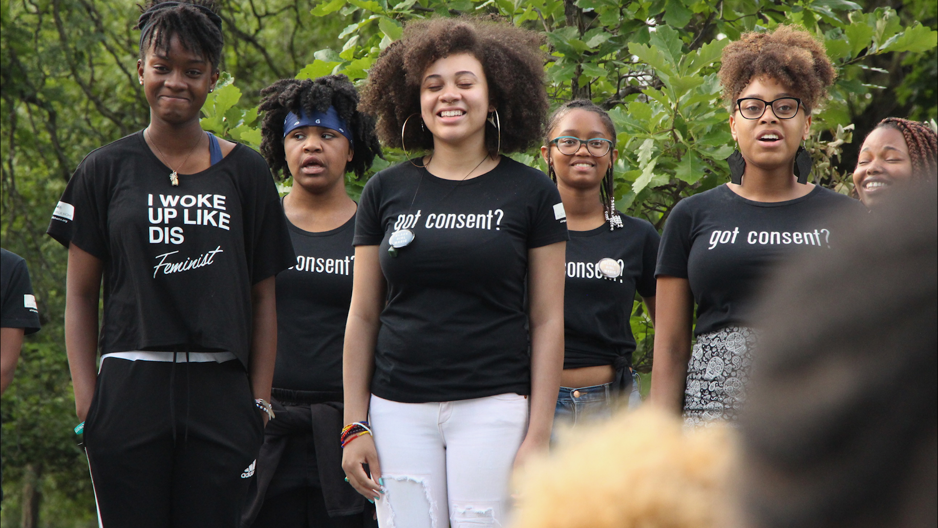  Girl/Friends perform a group poem for the audience. 