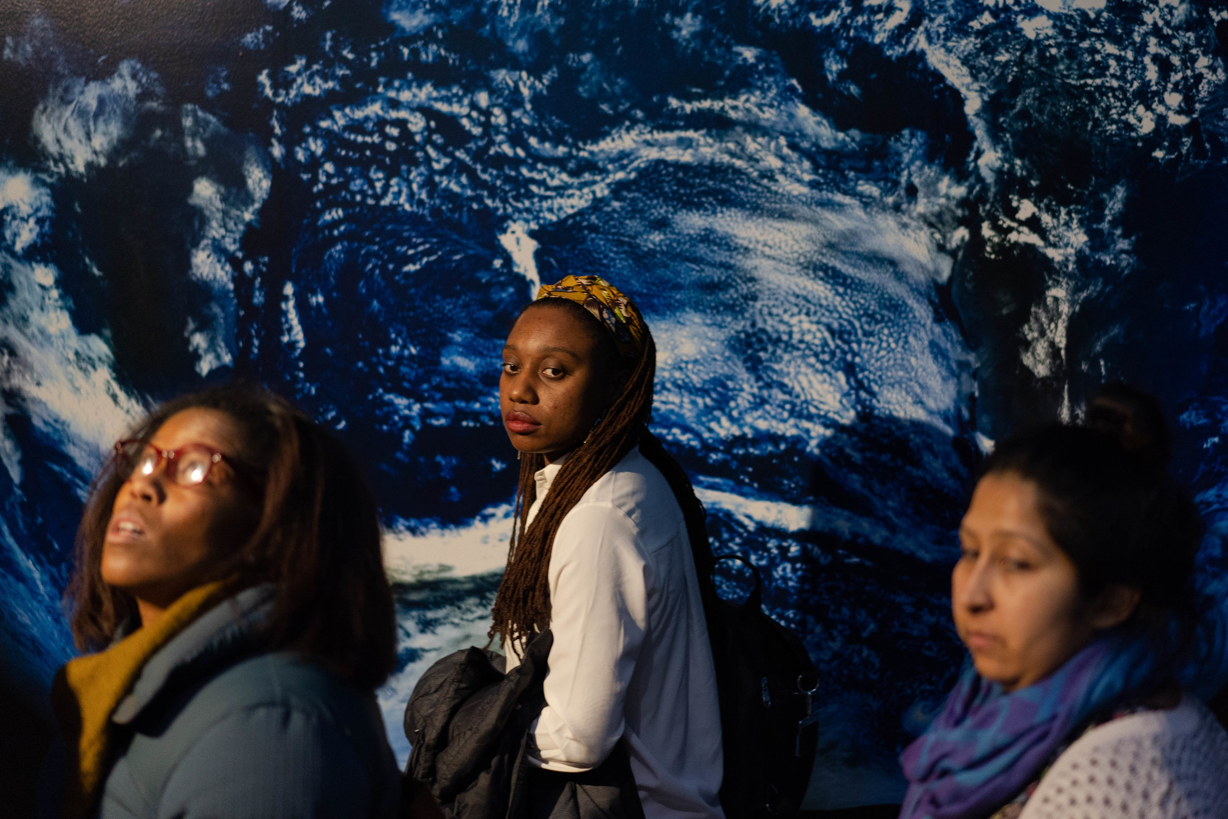  People browse the exhibits at Adler Planetarium.    