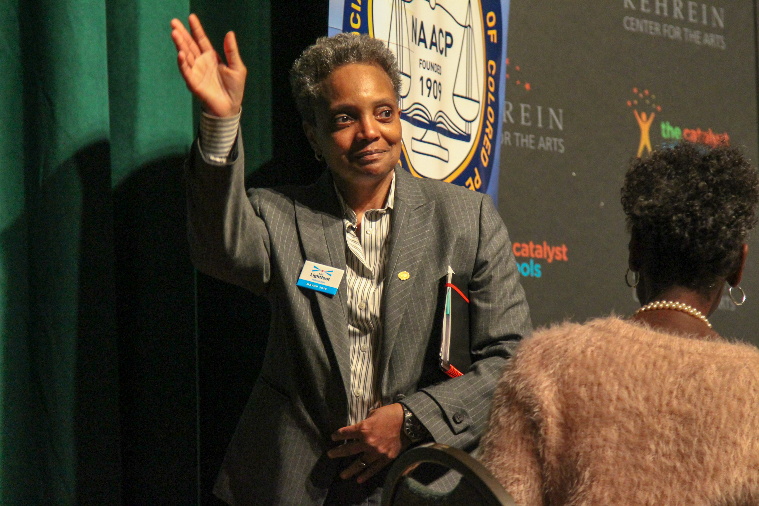 Lori Lightfoot greets