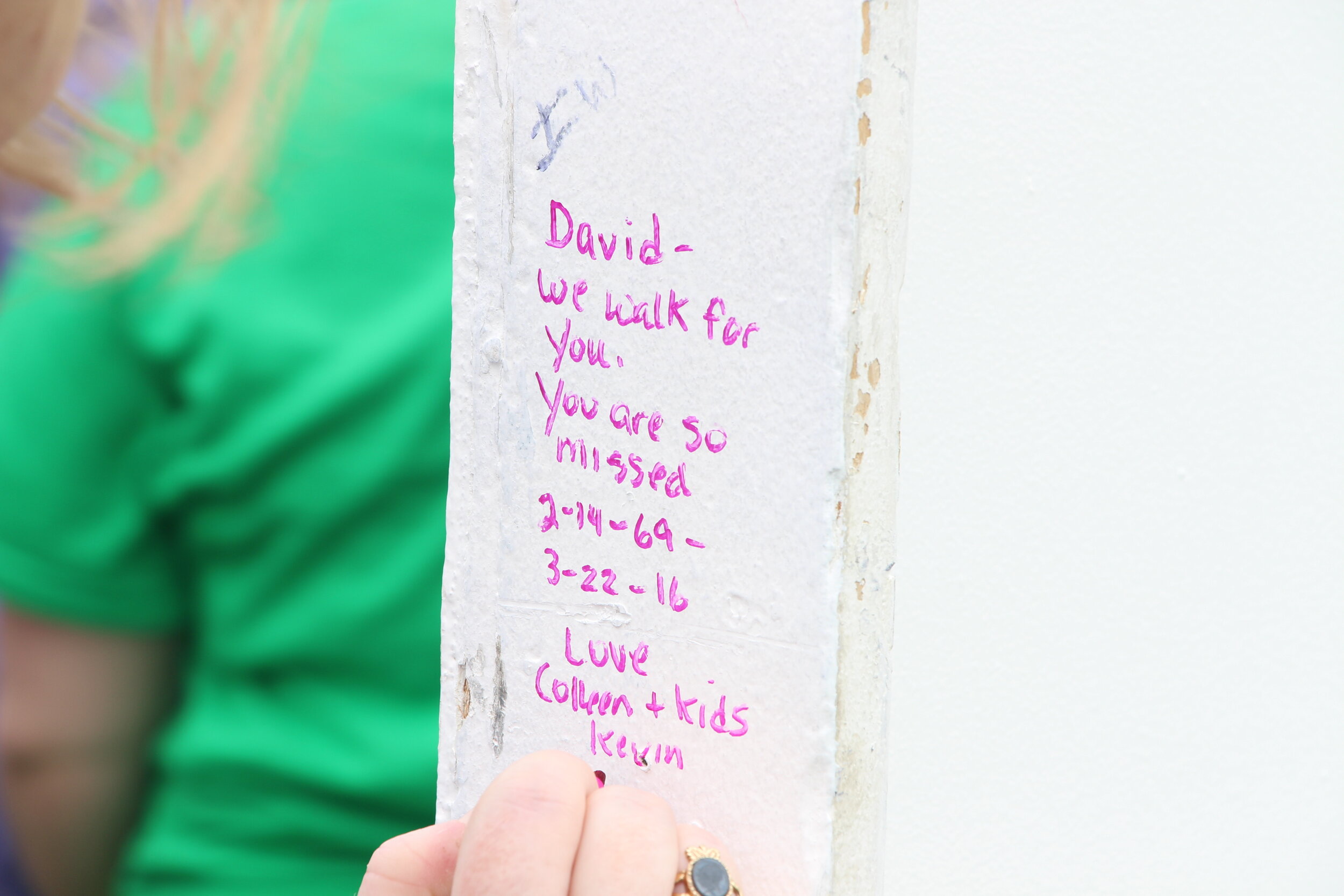 A close-up of a personal message on the Why I Walk Wall.