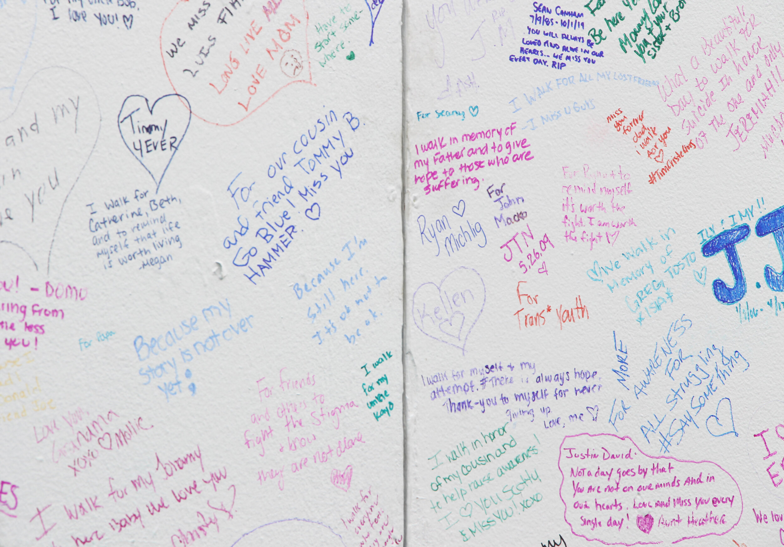  Participants wrote out their personal reasons for attending the walk in colorful messages on the  Why I Walk  wall. 