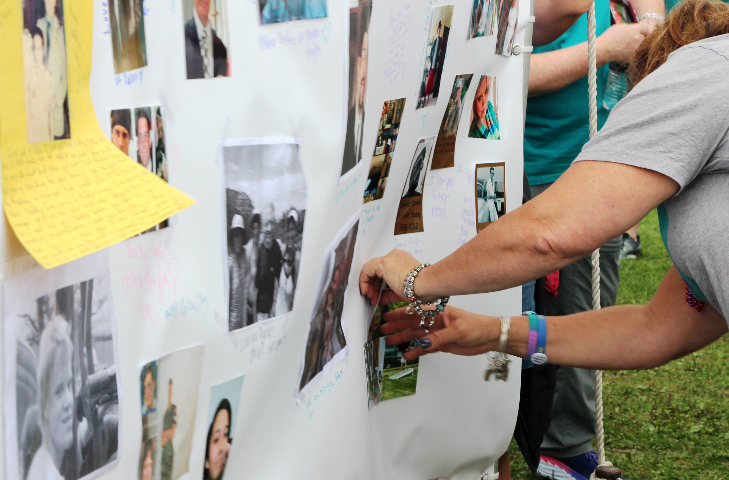 Photos and personal messages on the Memorial Wall honor friends and family member lost to suicide.