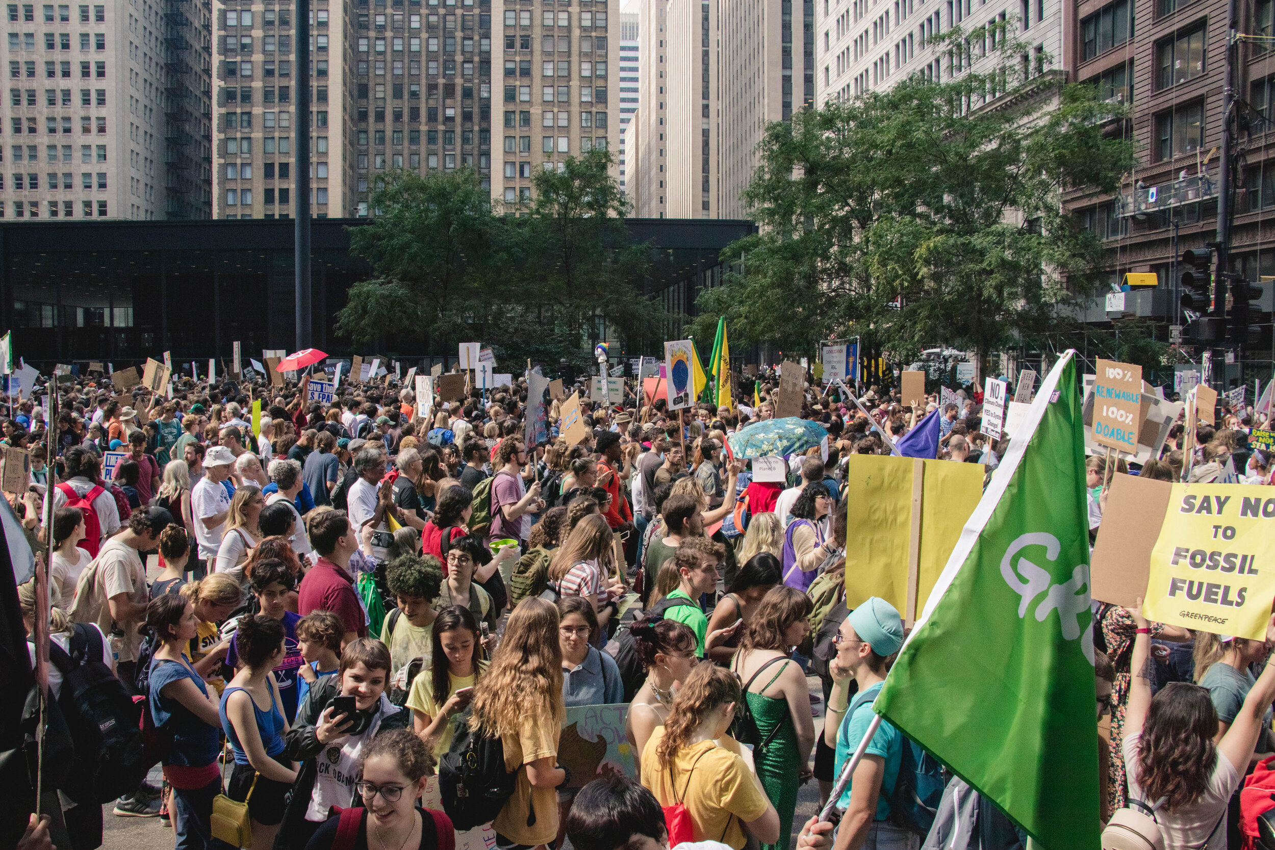 After marching for over a mile, the bulk of the organizers amassed at Federal Plaza. They crowded over a set of benches where youth leaders stood and read their speeches.