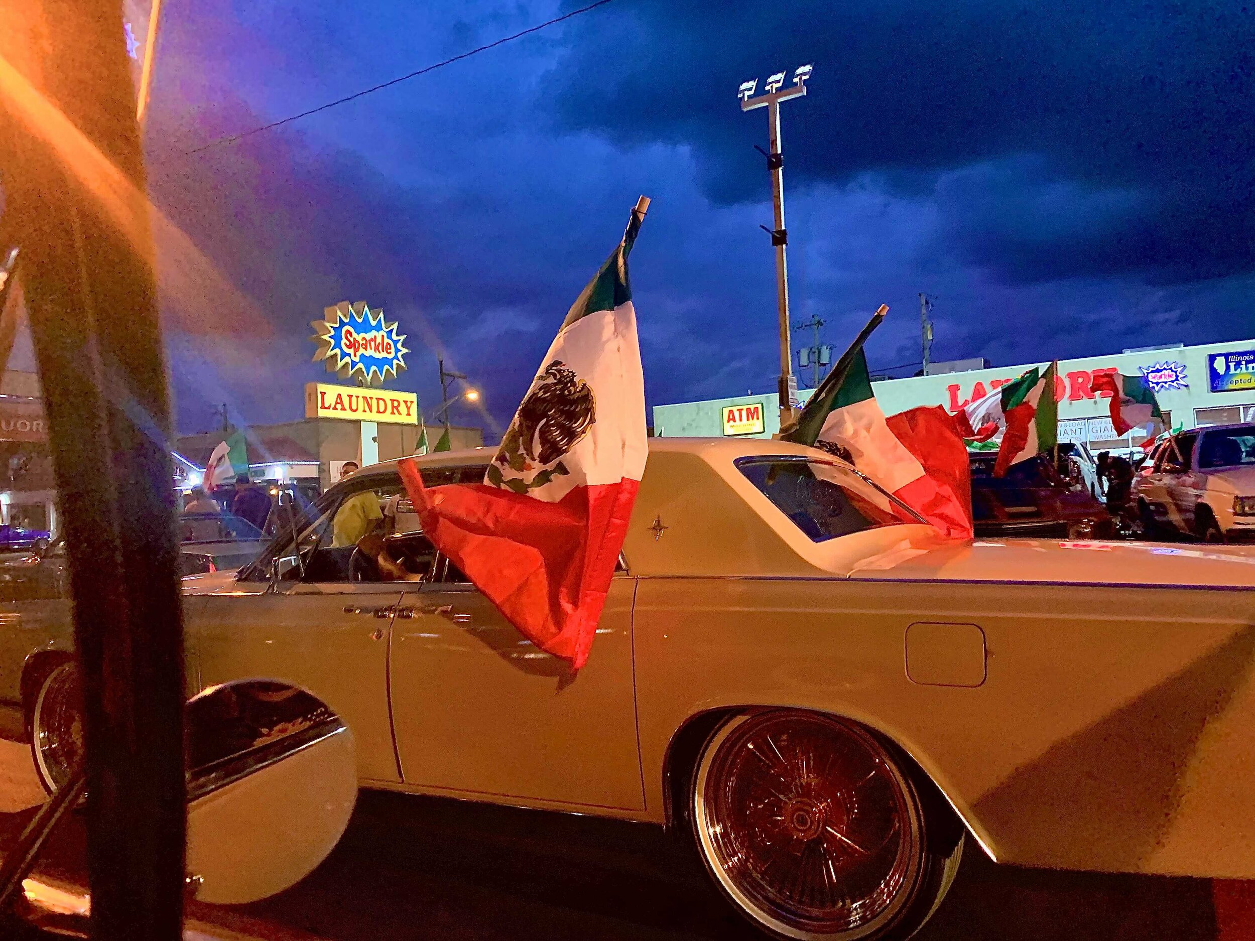  Every antique car was decorated with Mexican flags. 