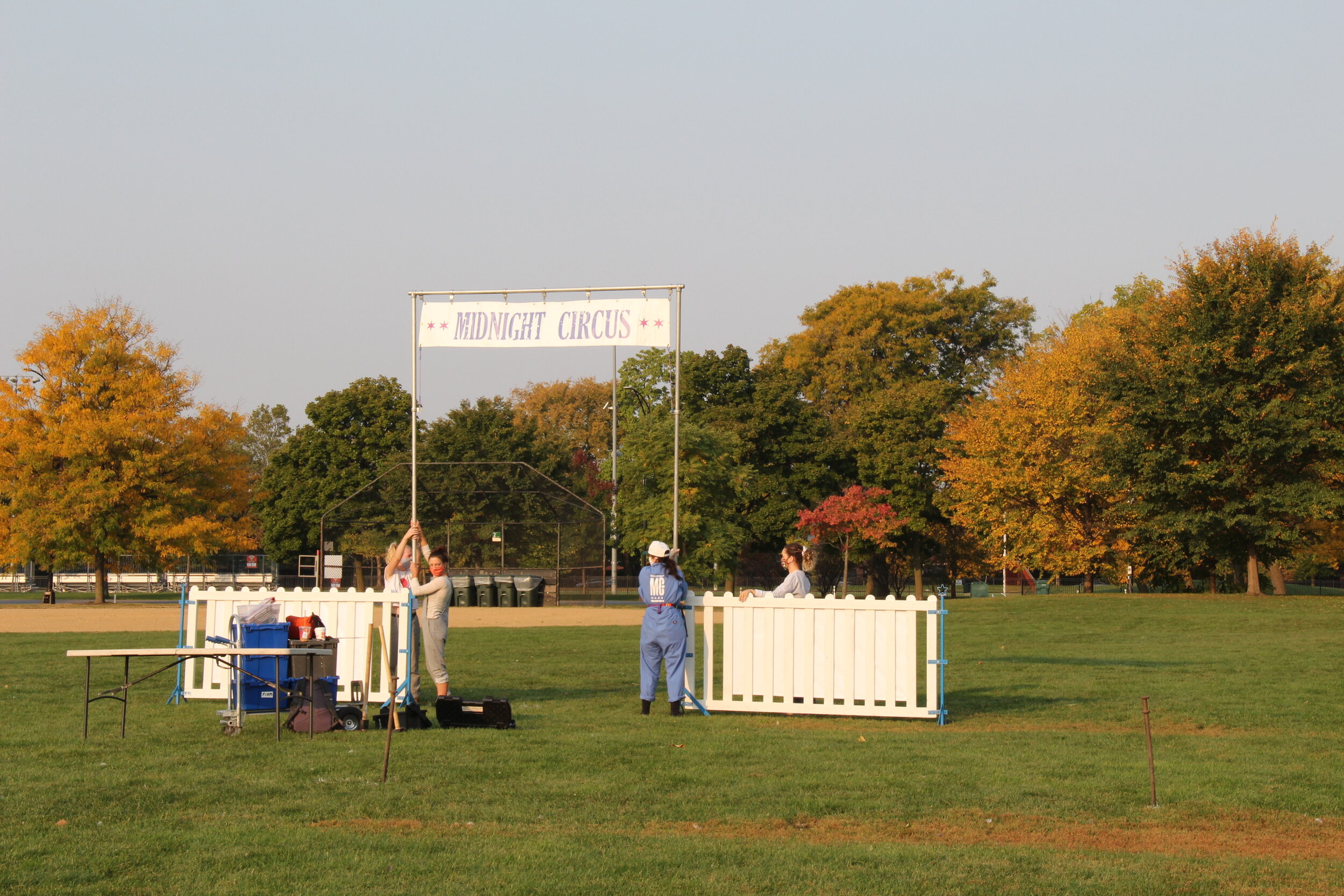  In the morning, the creative team plans out the sets up for the check-in booth for the 1 o'clock show at Park No. 218.(Photo taken by Sabrina Hart) 