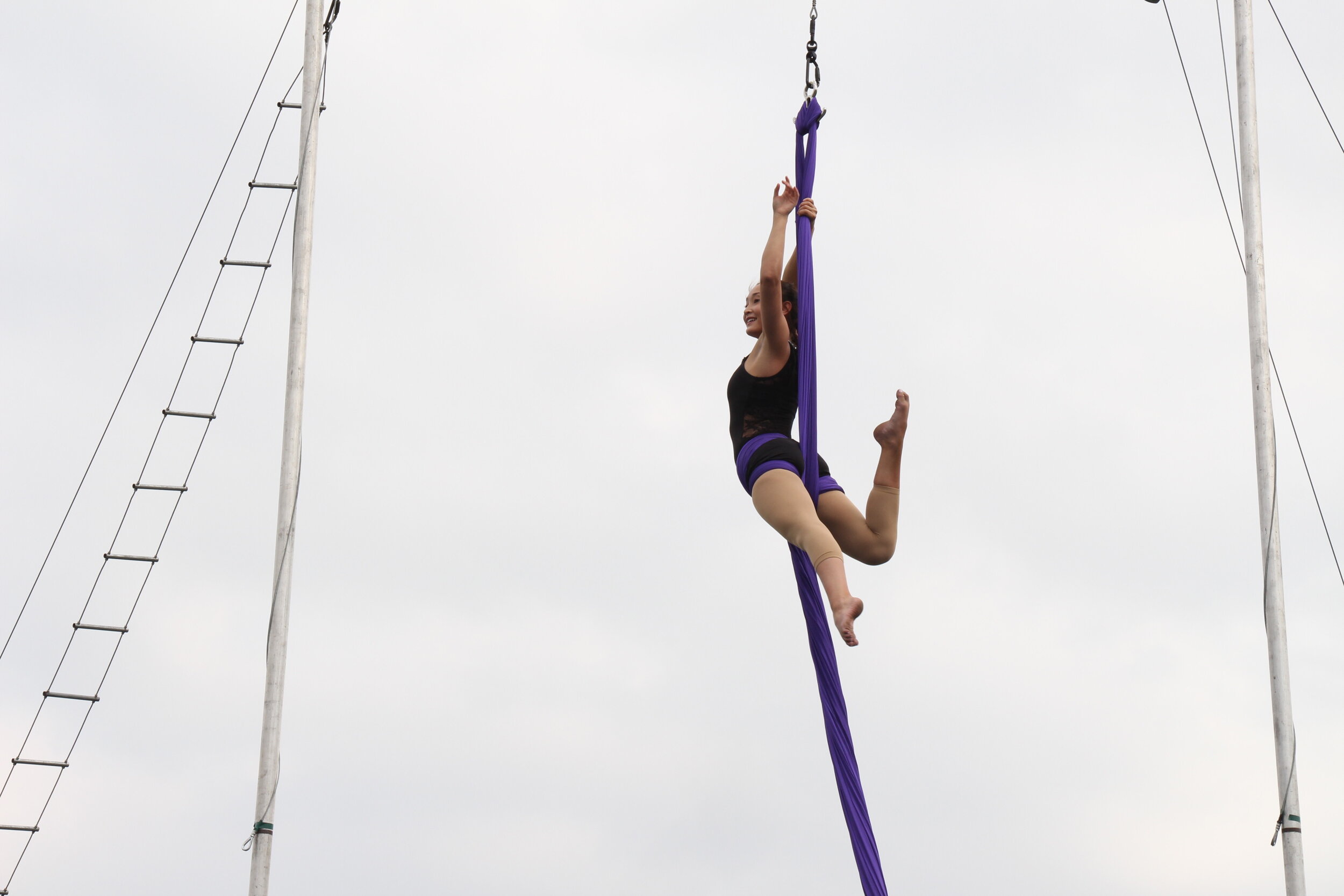  Regina Meirmanova performs aerial acrobatics with silk fabric to the song Youth by Daughter. (Photo taken by Sabrina Hart) 