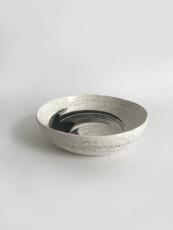 Swipe Bowl / $30 White clay with black sand, black underglaze design and clear glaze