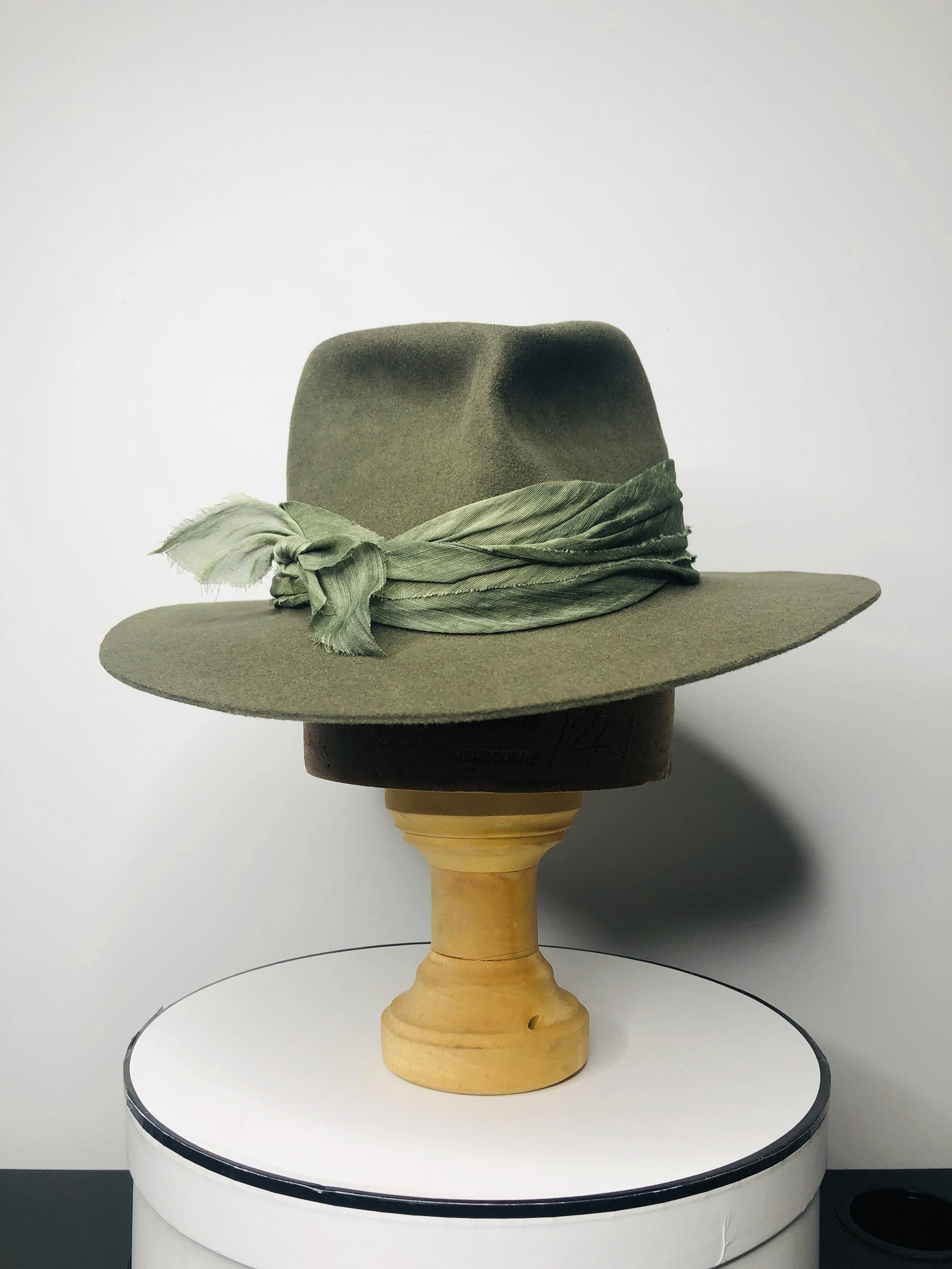 Moss Green felt hat perfect for a weekend away.