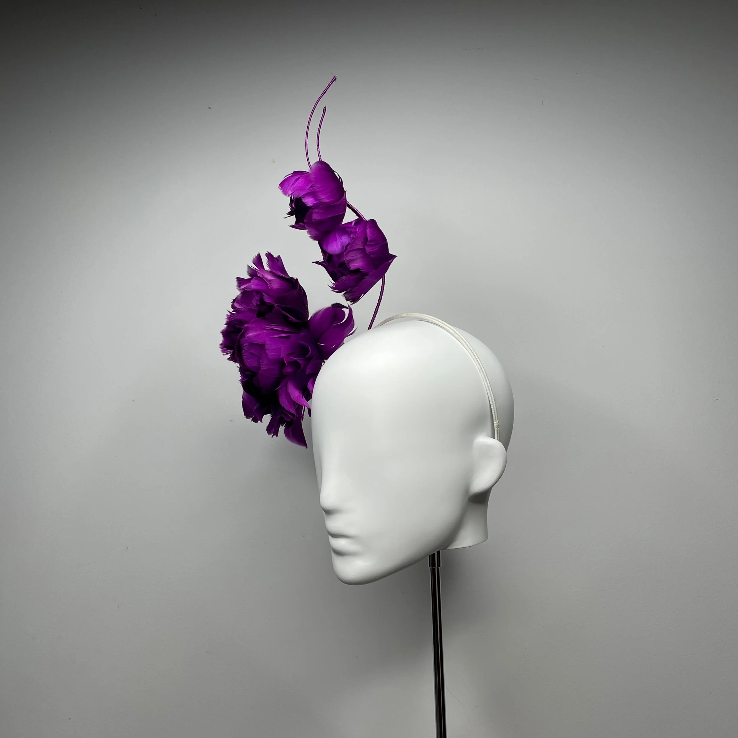 Wearable feather roses