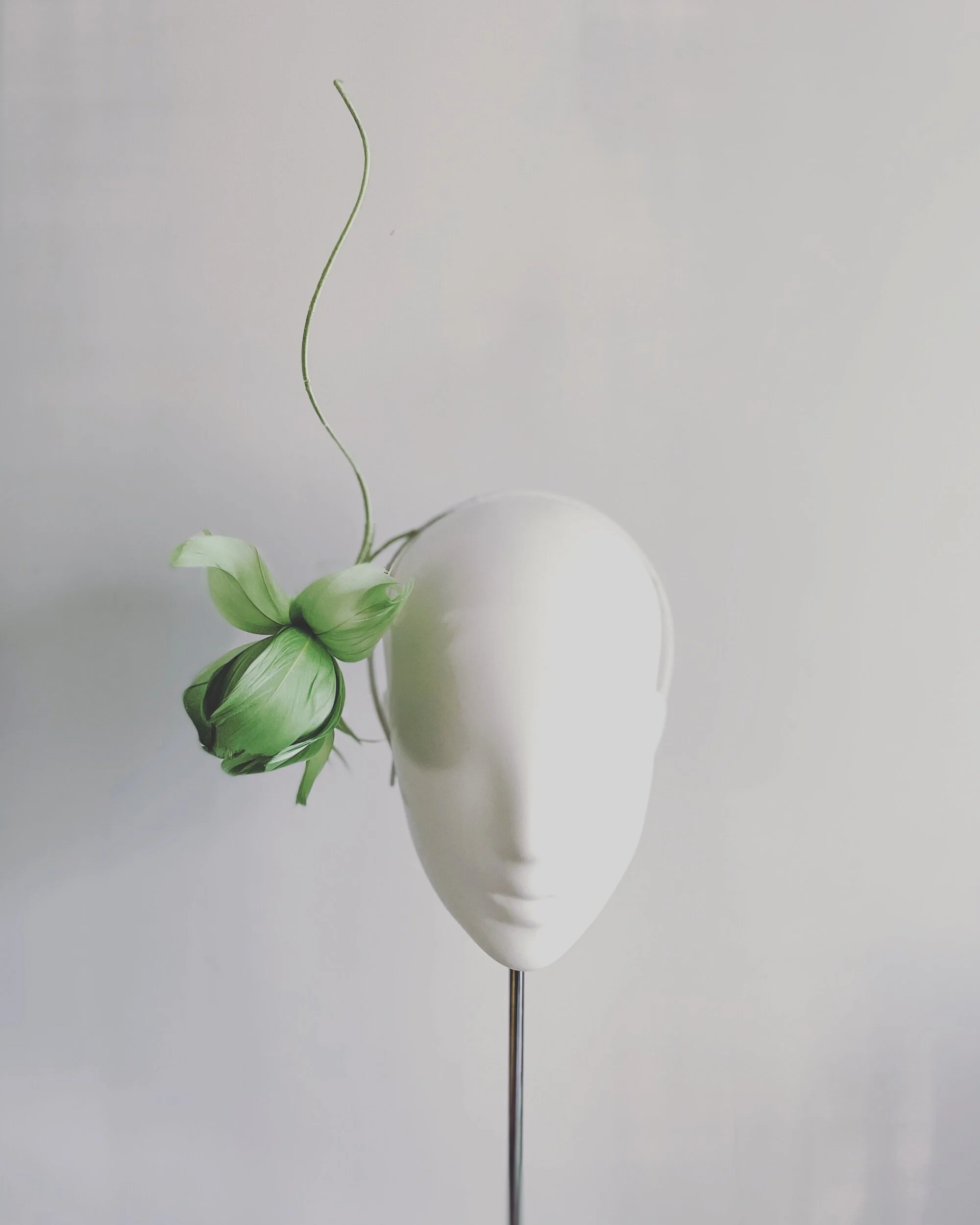 Single feather orchid headband in mint green