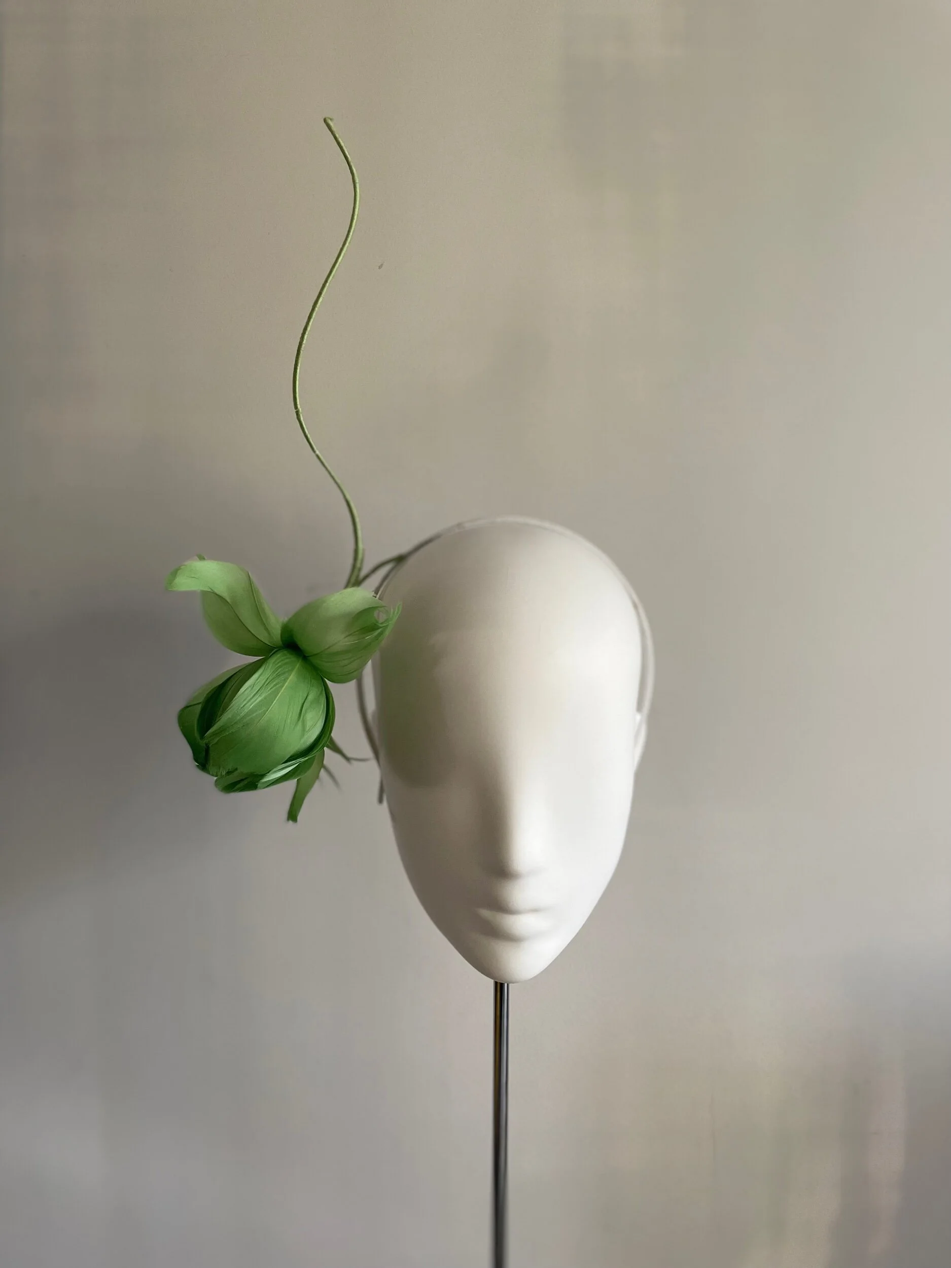 Single feather orchid headband in mint green