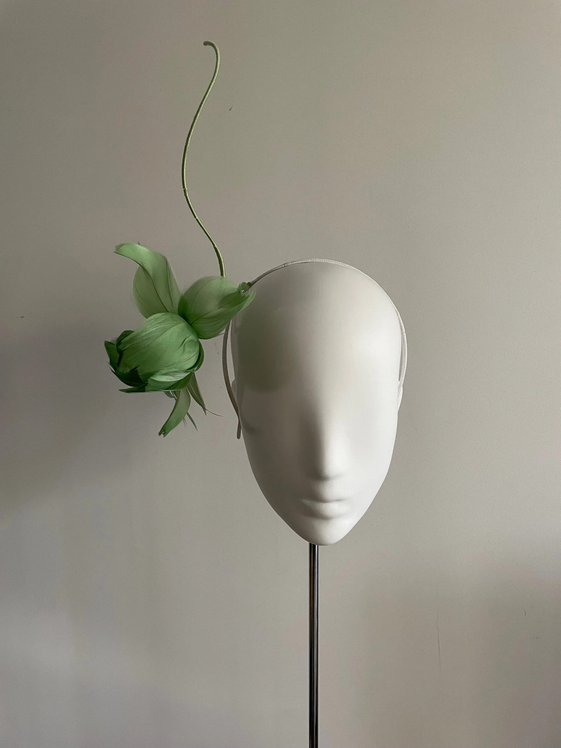 Single feather orchid headband in mint green