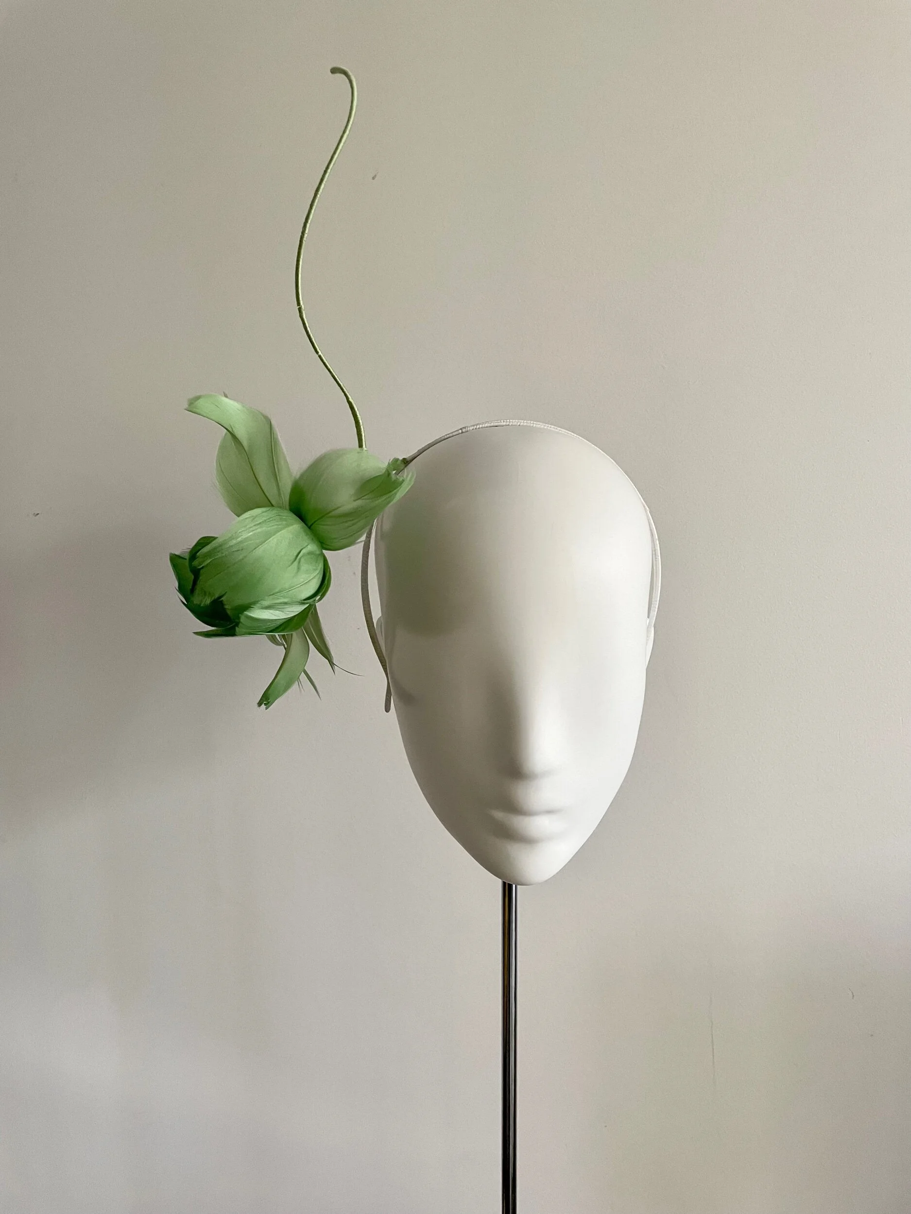 Single feather orchid headband in mint green
