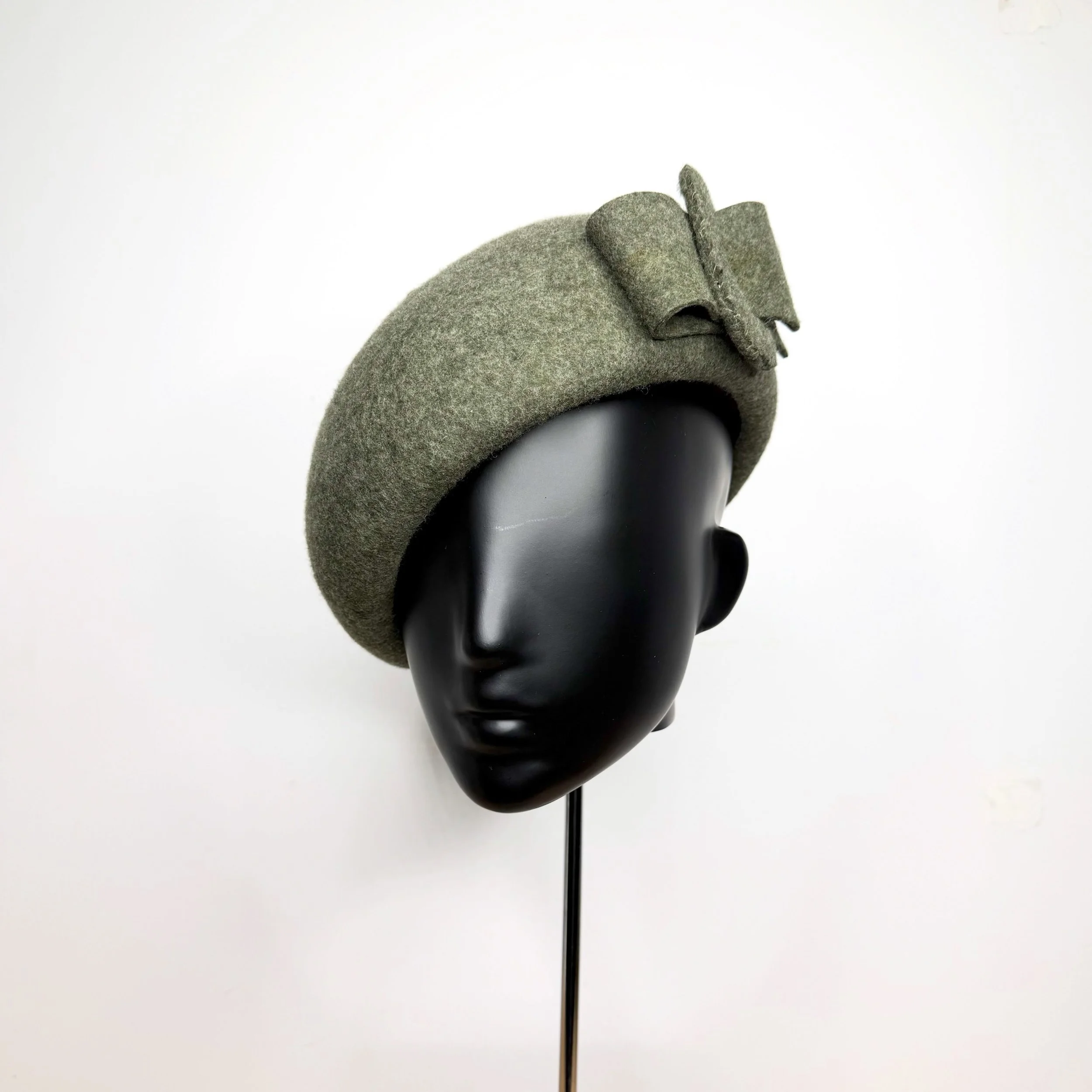 I think this is my favourite hat shape. It's so easy to wear and a perfect accessory upgrade for any outfit. The beret. Made in a soft moss green wool felt. 

#millinery #hat #beret #greenhat