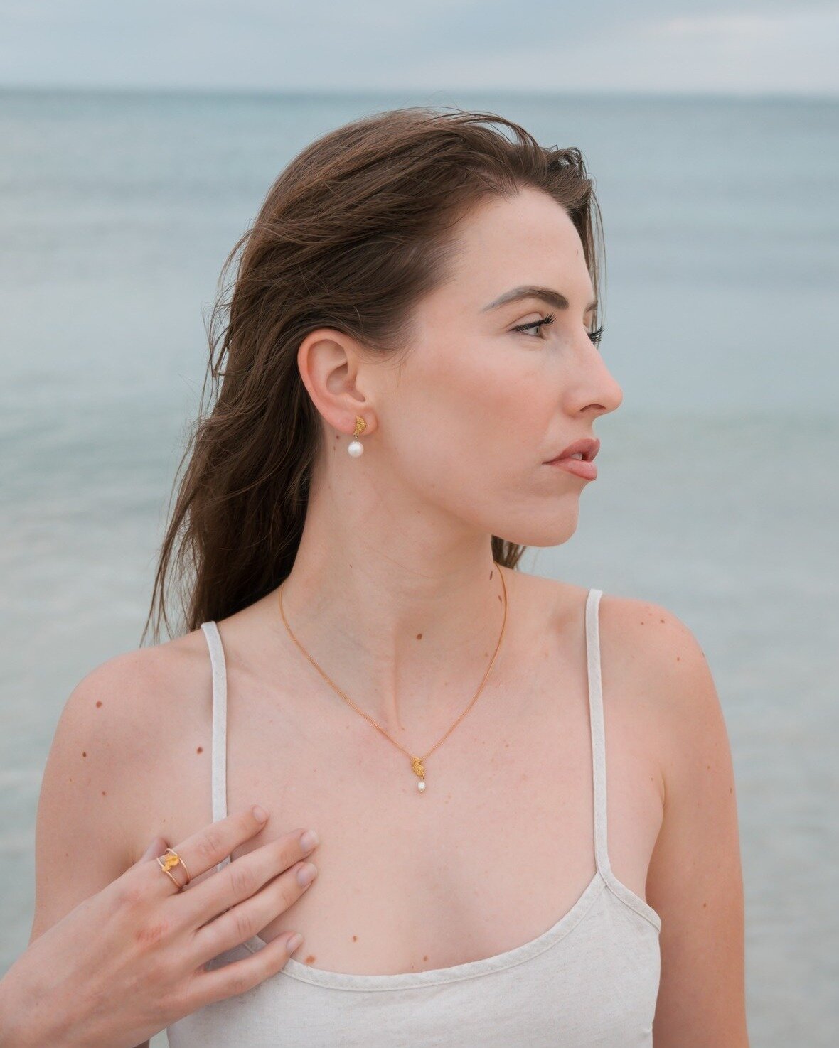 ✨ Introducing the Coastal Elegance Collection ✨ Immerse yourself in the allure of our latest creation, where the land meets the sea in perfect harmony. 🌊💫

Every piece in this collection is adorned with locally sourced gold nuggets and pearls, hand