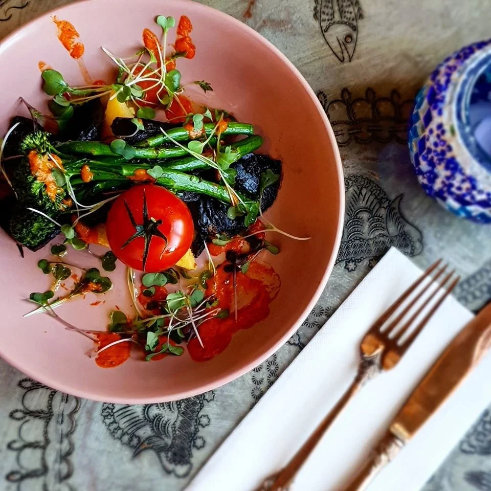 Plate of vibrantly coloured Mediterranean style food
