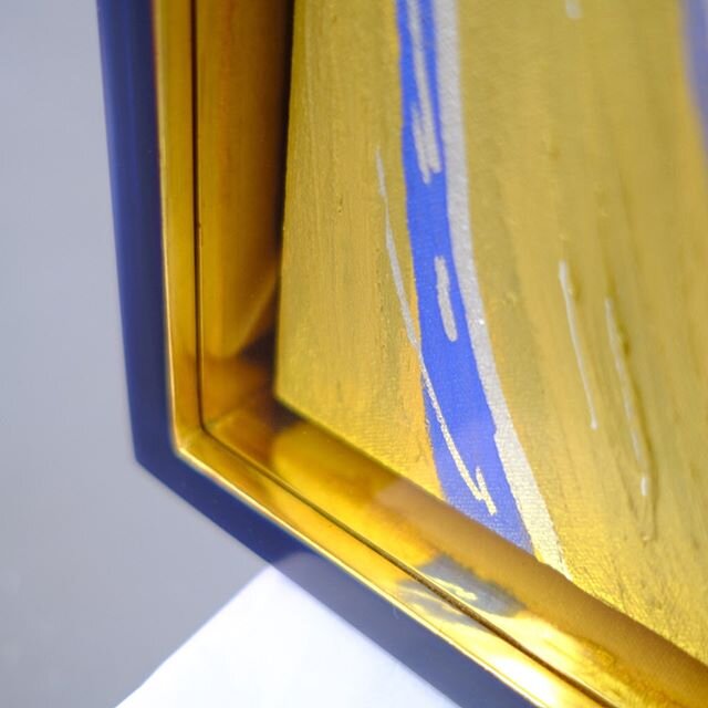 Our client wanted the gold in the painting to be reflected within the frame, so we gilded the inside frame edge as well as the fillets, and burnished to a mirror finish. The outside edges of the frame was gessoed and painted a lovely marine blue. Fra